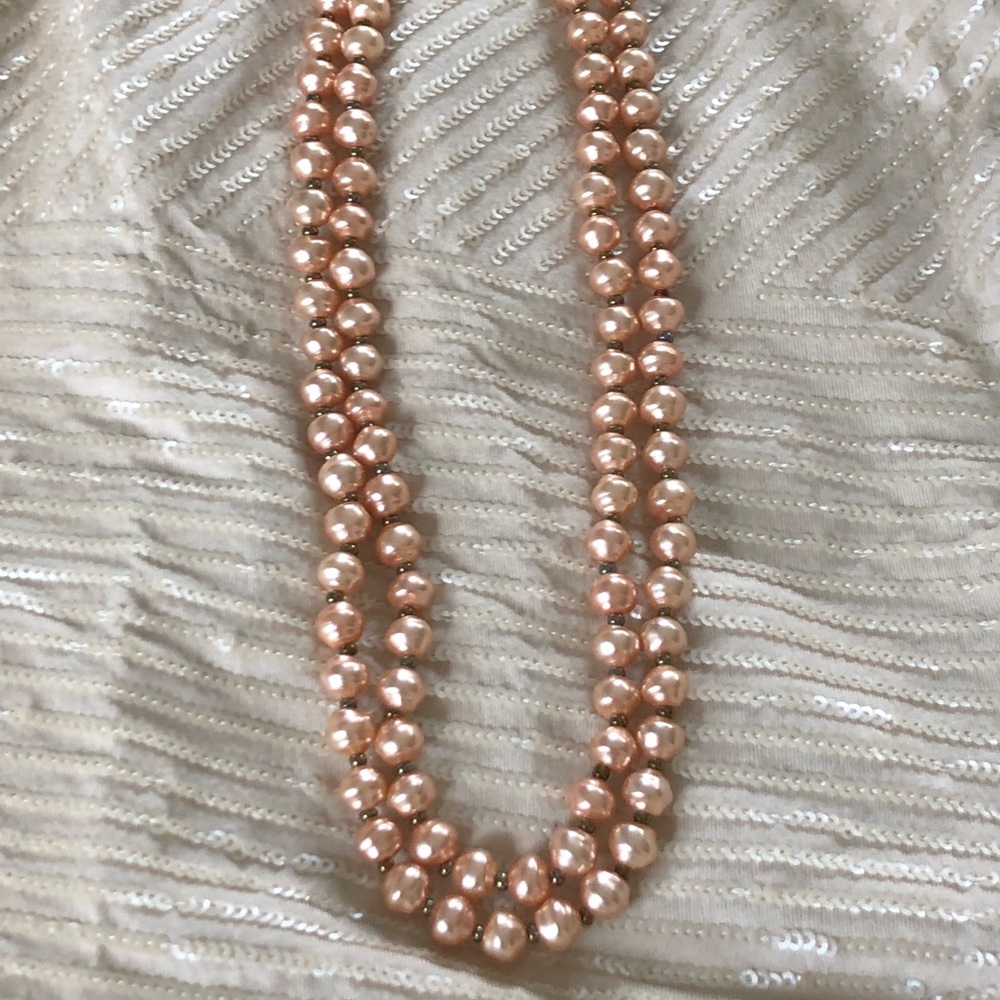 Double strand pearl bead necklace.